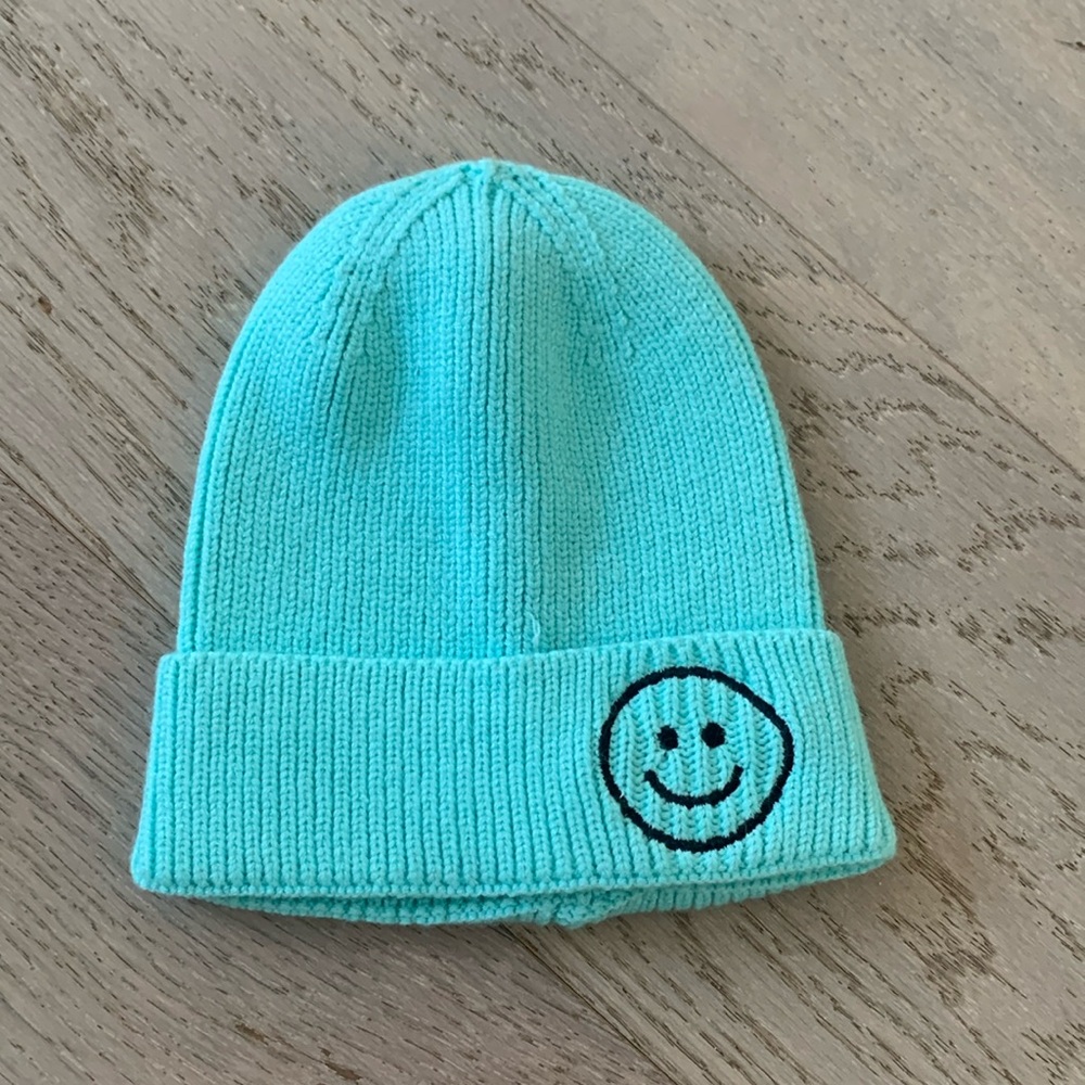 Teal beanie with smiley face NWT rainbow unicorn surprise brand from NYC